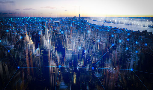 Aerial view of city at dusk